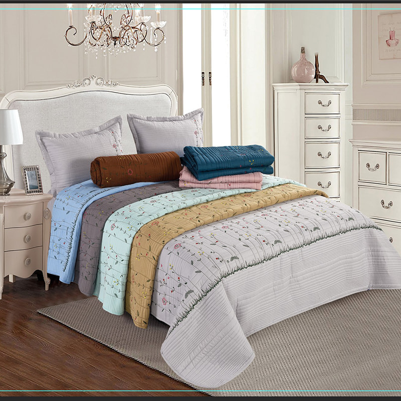 Cubierta de cama bordada acolchada