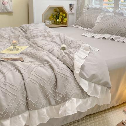 Elegantes conjuntos de ropa de cama Tufter